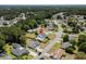 Aerial view of neighborhood showcasing a home with a pool at 601 Jousting Ct., Conway, SC 29526
