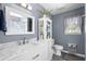 Neutral toned bathroom featuring a mirror and a vanity sink at 601 Jousting Ct., Conway, SC 29526