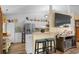 Modern kitchen includes bar seating and stainless steel appliances at 601 Jousting Ct., Conway, SC 29526