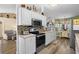 Well-equipped kitchen featuring stainless steel appliances and a central island for food preparation at 601 Jousting Ct., Conway, SC 29526
