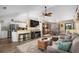 Open-concept living area connects the kitchen, dining, and living spaces at 601 Jousting Ct., Conway, SC 29526