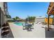 Exterior pool area with patio furniture, a shed, and landscaping, creating a relaxing oasis at 601 Jousting Ct., Conway, SC 29526