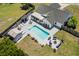 The pool has an area for lounging, outdoor seating, a grill, and a shed at 601 Jousting Ct., Conway, SC 29526