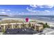 Aerial view of a complex, parking, and beach at 6309 N Ocean Blvd. # 14 E, North Myrtle Beach, SC 29582