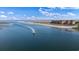 Picturesque aerial view of an oceanfront condo complex situated on a sandy beach with calm waterways at 6309 N Ocean Blvd. # 14 E, North Myrtle Beach, SC 29582