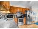 This spacious kitchen features stainless steel appliances, tile backsplash, and granite countertops at 6309 N Ocean Blvd. # 14 E, North Myrtle Beach, SC 29582