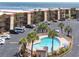 Beautiful condo complex pool area with well-manicured landscaping and a relaxing resort-like atmosphere at 6309 N Ocean Blvd. # 14 E, North Myrtle Beach, SC 29582