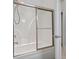 Enclosed bathtub with sliding glass door at 806 Compass Point Dr., North Myrtle Beach, SC 29582