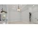 The dining room boasts an elegant chandelier and plenty of room to entertain Gathering and friends at 806 Compass Point Dr., North Myrtle Beach, SC 29582