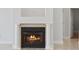 A cozy fireplace with a decorative mantle and columns creates a warm ambiance at 806 Compass Point Dr., North Myrtle Beach, SC 29582