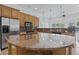 Bright kitchen featuring stainless steel appliances, granite countertops, and a large island at 806 Compass Point Dr., North Myrtle Beach, SC 29582