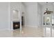 Spacious living room with a cozy fireplace and lots of natural light at 806 Compass Point Dr., North Myrtle Beach, SC 29582