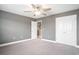 Bedroom featuring neutral carpet, ceiling fan and closet space at 8076 Fort Hill Way, Myrtle Beach, SC 29579