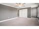 Bedroom featuring a ceiling fan, carpet, and a double door closet at 8076 Fort Hill Way, Myrtle Beach, SC 29579