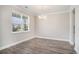 Elegant dining room with modern chandelier and hardwood flooring at 8076 Fort Hill Way, Myrtle Beach, SC 29579