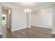 Open-concept dining room featuring neutral walls and flooring at 8076 Fort Hill Way, Myrtle Beach, SC 29579