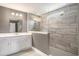 Modern main bathroom with gray tiled shower and glass partition at 8076 Fort Hill Way, Myrtle Beach, SC 29579