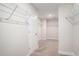 Large walk-in closet with ample shelving and storage for clothes and other items at 8076 Fort Hill Way, Myrtle Beach, SC 29579