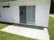 Covered back patio with white siding at 811 Rogers Rd., Myrtle Beach, SC 29577