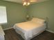 Bedroom with neutral walls, ceiling fan, and a window letting in natural light at 811 Rogers Rd., Myrtle Beach, SC 29577