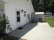 Side view of the house with patio and storage shed at 811 Rogers Rd., Myrtle Beach, SC 29577