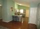 Open layout with kitchen island bar and stainless steel appliances at 811 Rogers Rd., Myrtle Beach, SC 29577