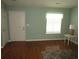 The living room is bright and spacious with hardwood floors and a window at 811 Rogers Rd., Myrtle Beach, SC 29577