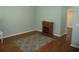 The living room features hardwood floors with a fireplace and neutral walls at 811 Rogers Rd., Myrtle Beach, SC 29577