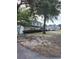 Charming two-story home with a well-manicured lawn and mature trees, offering a serene and picturesque neighborhood setting at 903 23Rd Ave. N, North Myrtle Beach, SC 29582