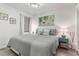 Relaxing bedroom featuring a queen bed, stylish coastal decor, and a serene atmosphere at 920 N Waccamaw Dr. # 2102, Murrells Inlet, SC 29576