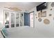 Cozy bedroom with mirrored closet doors, coastal decor, and a view into the hallway at 920 N Waccamaw Dr. # 2102, Murrells Inlet, SC 29576