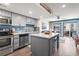 Beautiful kitchen with stainless steel appliances, gray cabinets, island and easy access to living area at 920 N Waccamaw Dr. # 2102, Murrells Inlet, SC 29576