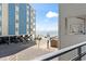 View from the balcony featuring parking, beach access, and ocean view at 920 N Waccamaw Dr. # 2102, Murrells Inlet, SC 29576