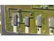 An aerial view captures meticulously maintained lawns, showcasing the overall community and backyard spaces at 924 Akron St., Conway, SC 29526