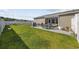 Expansive backyard with a well-maintained lawn and a spacious patio area for outdoor enjoyment at 924 Akron St., Conway, SC 29526