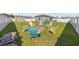 Lush backyard featuring Adirondack chairs around a fire pit, a shed, and a privacy fence at 924 Akron St., Conway, SC 29526