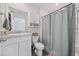 Bathroom with a white vanity, granite countertops, and a shower featuring a shower curtain at 924 Akron St., Conway, SC 29526