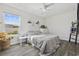 Bright bedroom with window, ceiling fan, and neutral walls, offering a peaceful retreat at 924 Akron St., Conway, SC 29526