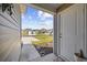 Inviting entryway with a view of the community featuring a concrete walkway and adjacent well-kept lawn at 924 Akron St., Conway, SC 29526