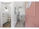 Open entryway with a view of the living space and bathroom; the home features modern neutral paint at 924 Akron St., Conway, SC 29526