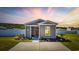 Charming single-story home featuring landscaped yard, concrete driveway, and neutral exterior paint at 924 Akron St., Conway, SC 29526