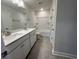 Bathroom with a double sink granite countertop at 9409 Long Meadow Way, Longs, SC 29568
