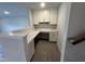 Bright home office space featuring custom built-ins, plenty of storage, and a sleek quartz countertop at 9409 Long Meadow Way, Longs, SC 29568