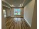 Open room with hardwood floors, recessed lighting, and trim at 9409 Long Meadow Way, Longs, SC 29568
