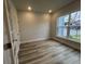 Bright and airy office with large window and wood floors at 9409 Long Meadow Way, Longs, SC 29568