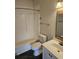Well-lit bathroom featuring a bathtub and shower combo, toilet, and sink vanity with mirror at 102 Scotch Broom Dr. # B-204, Little River, NC 29566