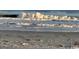 Dynamic beach view with crashing waves and sandy shoreline, showcasing the powerful ocean at 102 Scotch Broom Dr. # B-204, Little River, NC 29566