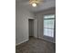 Neutral bedroom with a ceiling fan, natural light, and a closet for ample storage at 102 Scotch Broom Dr. # B-204, Little River, NC 29566