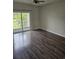 Bedroom with sliding glass doors leading to outdoor patio and view of nature at 102 Scotch Broom Dr. # B-204, Little River, NC 29566