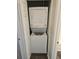 Stacked washer and dryer unit neatly tucked away in a closet for space-saving convenience at 102 Scotch Broom Dr. # B-204, Little River, NC 29566
